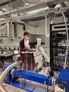 A Bachelor student, Fabio, posing with the chirped-pulse spectrometer